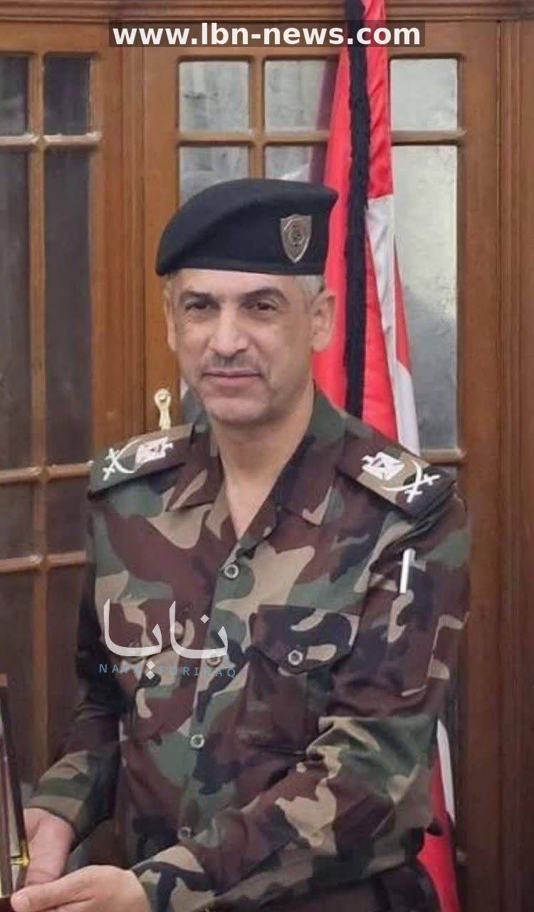 في كربلاء المقدسة، رفع صور القادة الشهداء بعد إزالتها صباحا