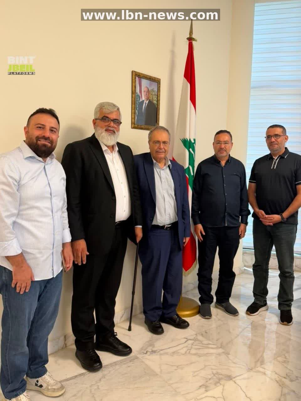 D. Tarek Metri receives report on destruction in Bint Jbeil