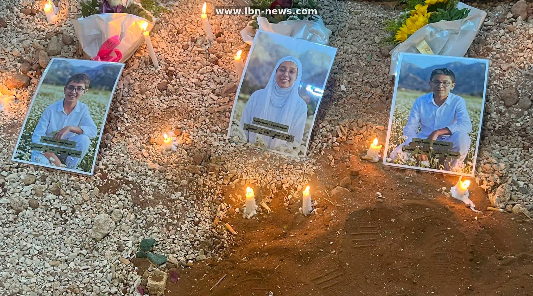 Photos of children killed in Ansar strike remain above their graves